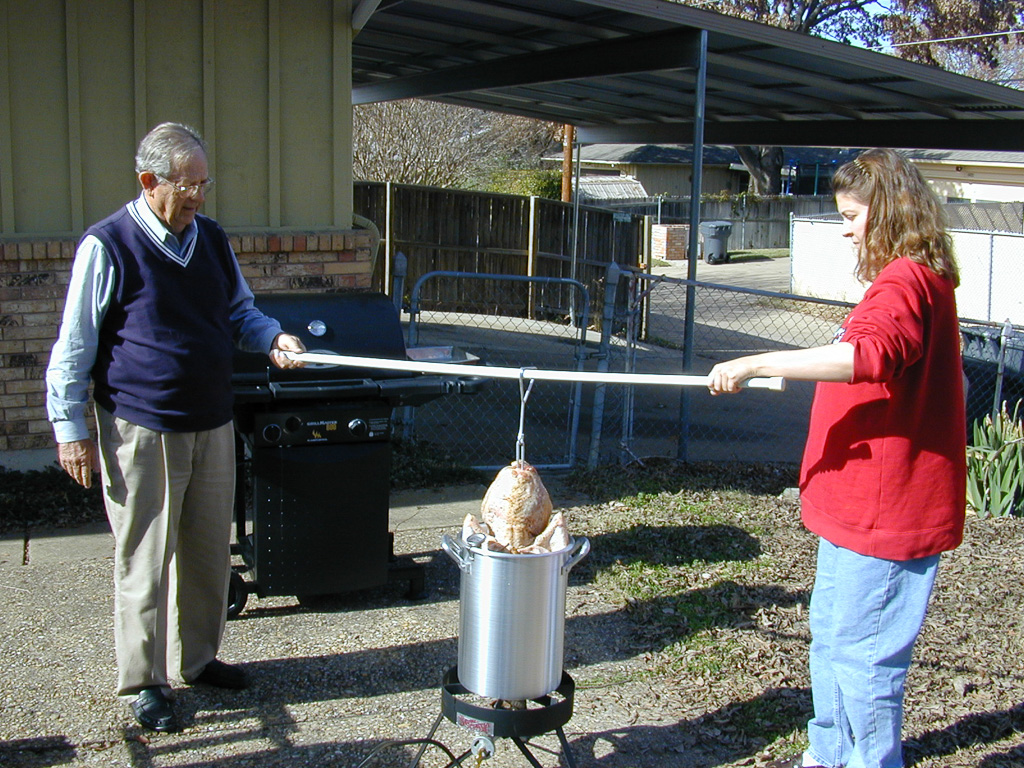 Dad & Scherre frying a turkey
