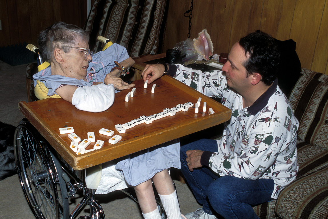 Beanie & Mike playing dominoes