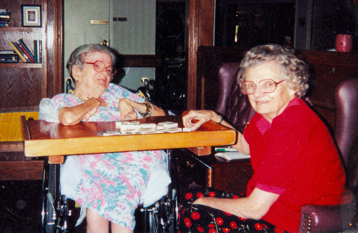 Beanie & Mom playing dominoes