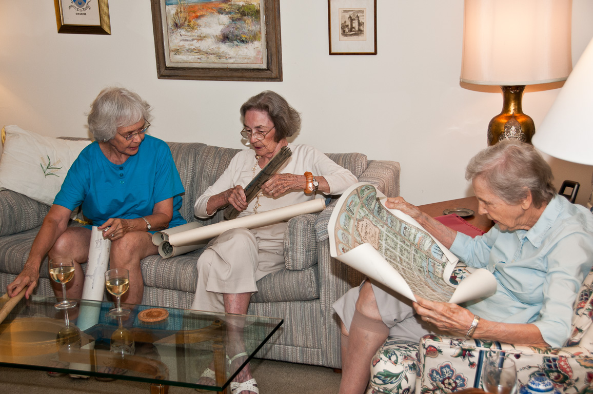 Betty, Sarah & Gertrude looking at old plans