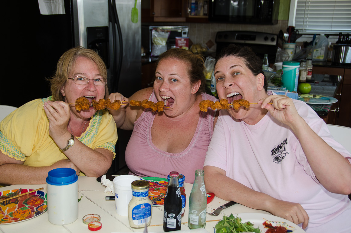 Martha, Kristy & Scherre eating fried shrimp