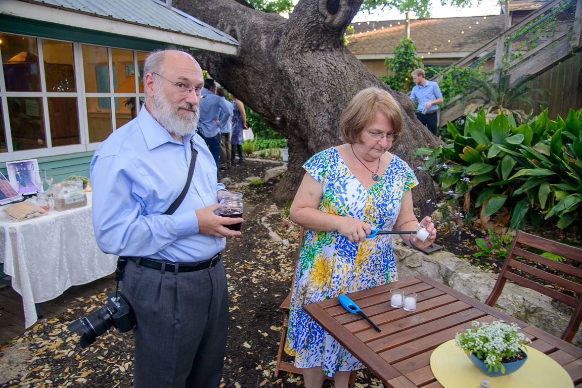 Paul and Martha lighting candles